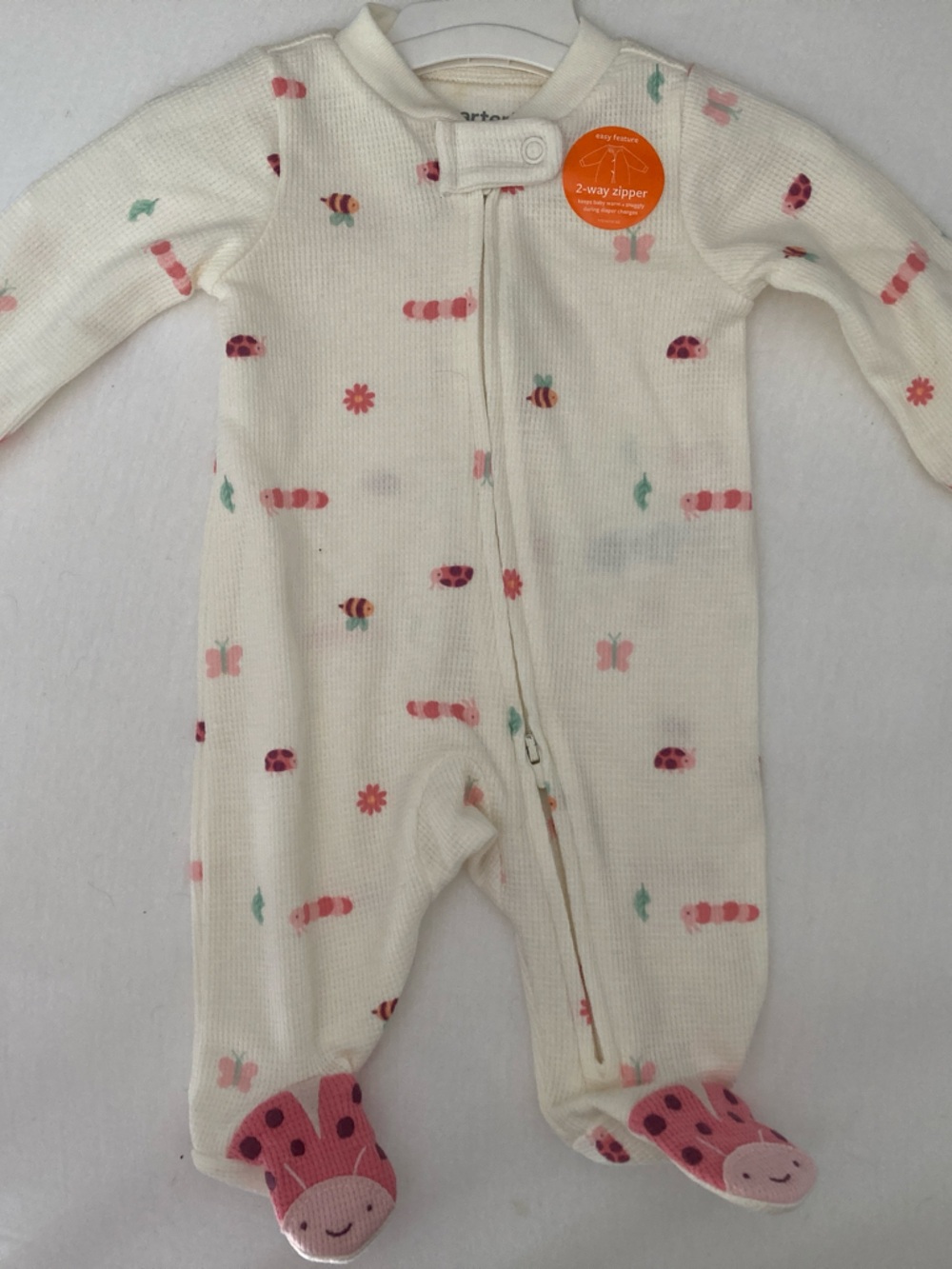 Cream Baby Footed One-Piece with Pink Bug Print